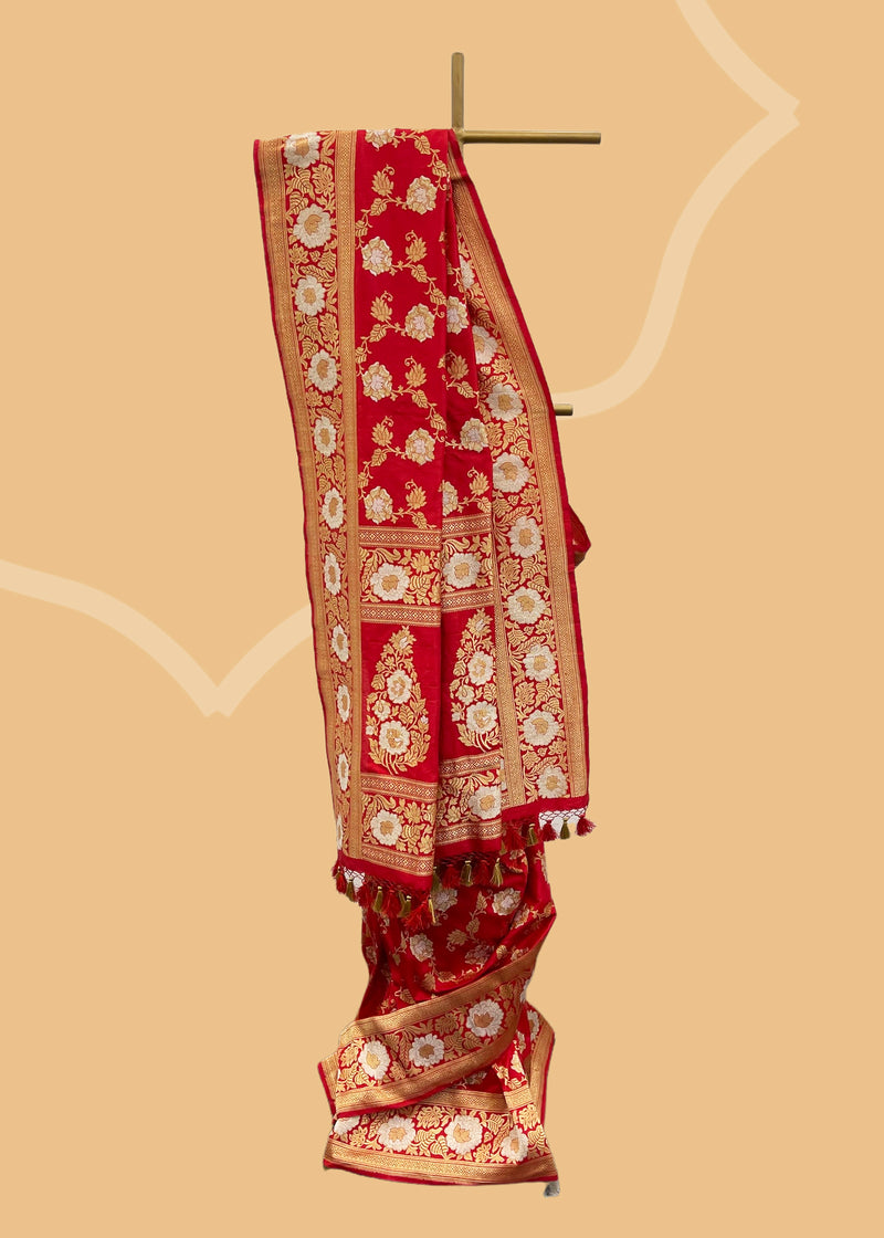 Red ektaara silk sona rupa pure banarasi handwoven saree by Roliana. Shop the best collection of authentic, handwoven, pure benarasi sarees with Roliana New Delhi