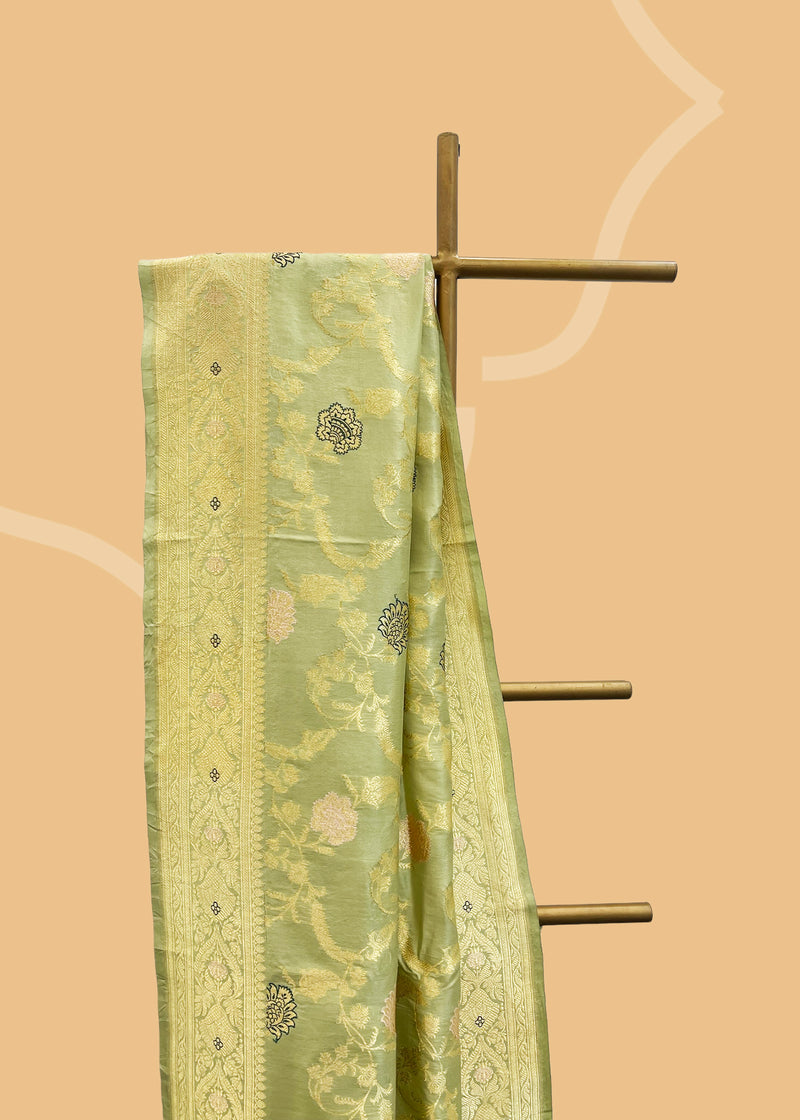Pista Green meenakari pure banarasi silk saree. Shop the best collection of authentic, handwoven, pure benarasi sarees with Roliana New Delhi