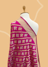 Rani pink ektaara silk pure banarasi saree. Shop the best collection of authentic, handwoven, pure benarasi sarees with Roliana New Delhi