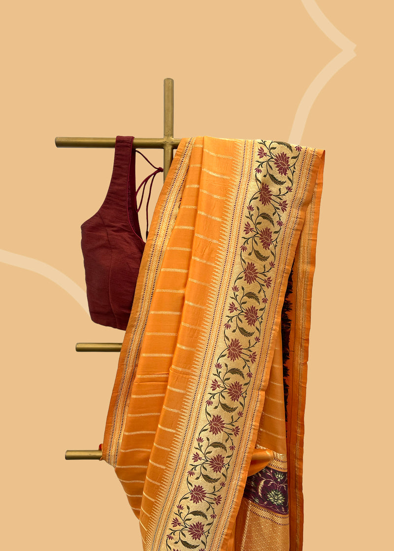 Orange pure banarasi silk saree woven with meenakari work by Roliana Weaves Shop the best collection of authentic, handwoven, pure banarasi sarees with Roliana New Delhi