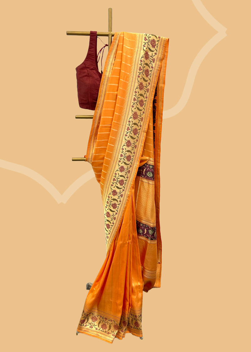 Orange pure banarasi silk saree woven with meenakari work by Roliana Weaves Shop the best collection of authentic, handwoven, pure banarasi sarees with Roliana New Delhi