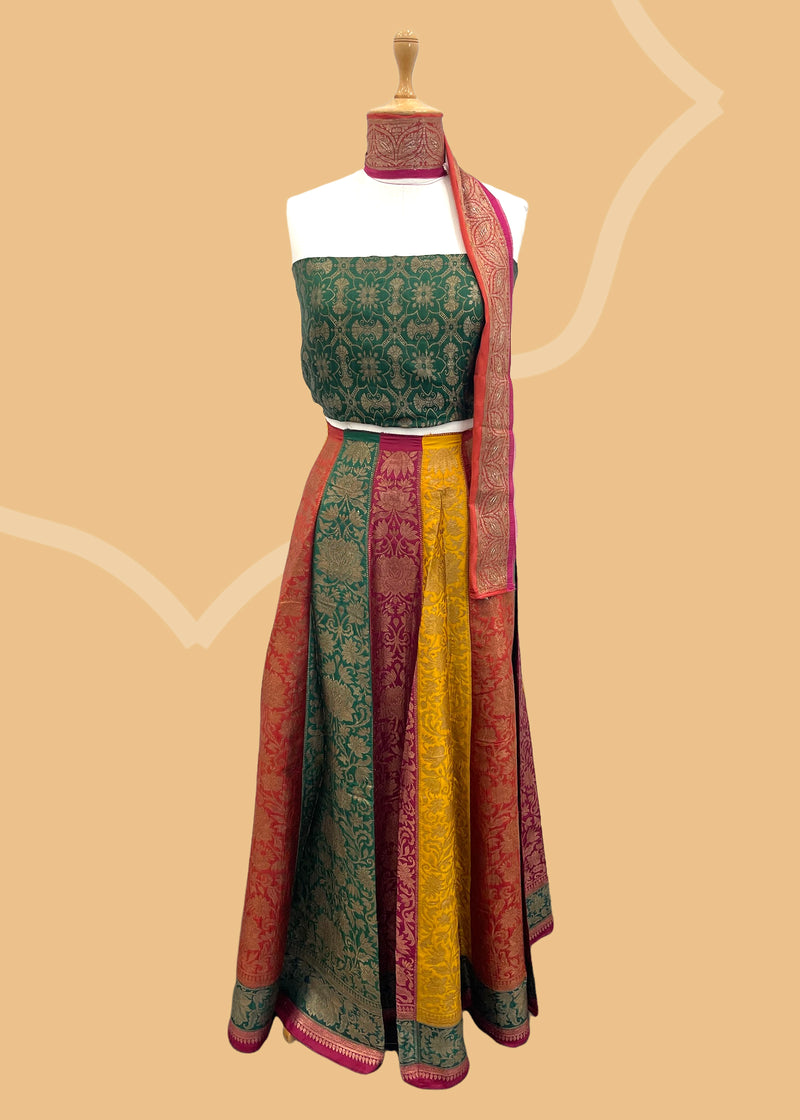 Multicolour pure silk banarasi lehenga by Roliana Weaves. Shop the best of Pure Benarasi sarees and lehengas at Roliana New Delhi.